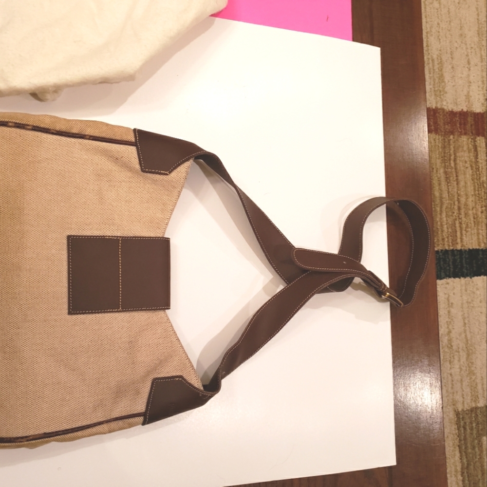 Russell $ Bromley female handbag .